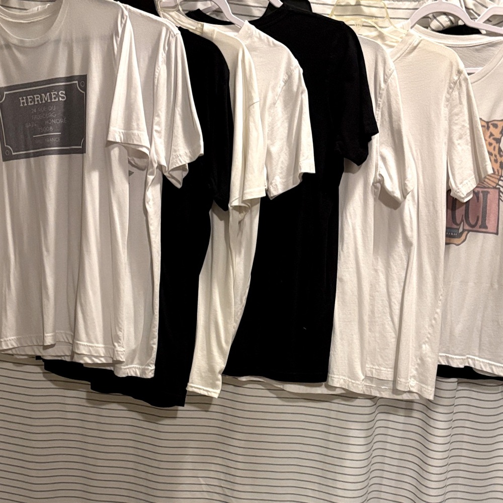 EUC worn once these graphic tees size large are sold as set 9 shirts